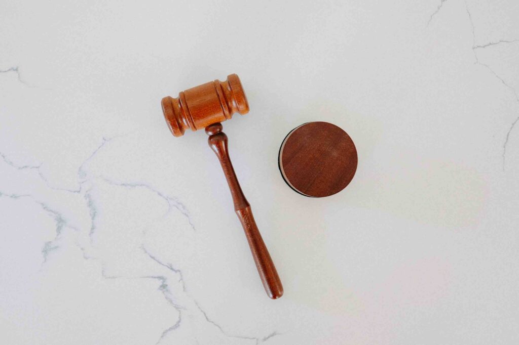 A judge's gavel, symbolizing the emerging intersection of law and AI.